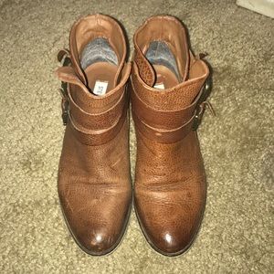 Used ankle boots with straps. Worn out look